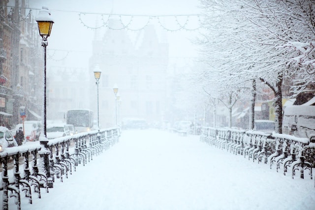 Snow_Covered_Walkway_Downtown_With_Street_Lights